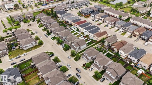 Aerial view of a residential neighborhood featuring multiple detached homes with varying rooflines and neutral exterior finishes - 16810 53 Street, Edmonton, AB 