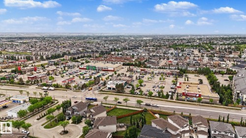 Expansive aerial perspective showcasing a residential area with extensive urban development - 16810 53 Street, Edmonton, AB 