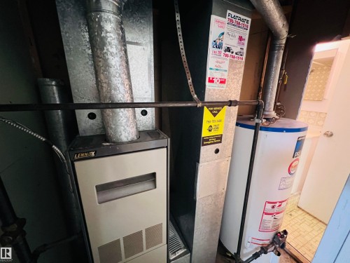 Lennox furnace and water heater installation - 2544 79 Street, Edmonton, AB - Indoor Photo Showing Basement