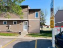 Two-story residential building with light brown siding and white trim - 2544 79 Street, Edmonton, AB  - Outdoor 