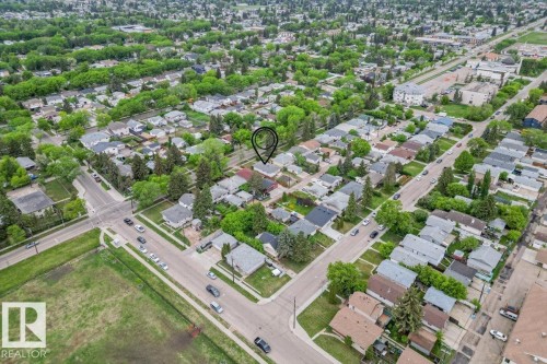 Aerial perspective of a residential neighborhood featuring established homes and extensive tree canopy - 12923 113A Street, Edmonton, AB 