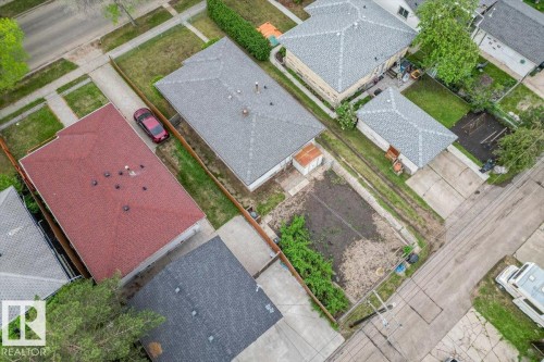 Rectangular property featuring a red asphalt shingle roof - 12923 113A Street, Edmonton, AB 