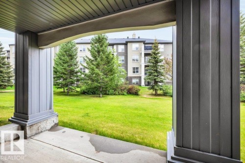Covered patio featuring fluted columns and a concrete surface - 116 630 Mcallister Loop, Edmonton, AB 