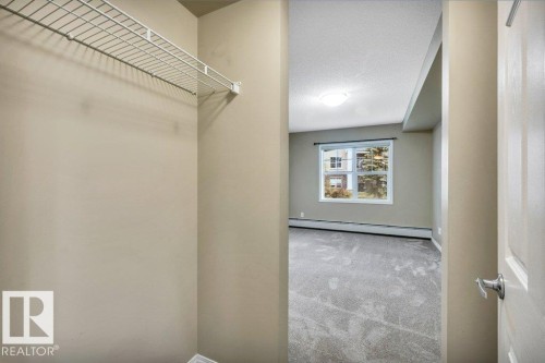 Closet featuring wire shelving system - 116 630 Mcallister Loop, Edmonton, AB 