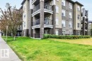 Multi-story building featuring brick and stucco exterior - 116 630 Mcallister Loop, Edmonton, AB 