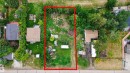 Expansive rectangular lot featuring a mix of mature trees and open grassy areas - 337 Smith Crescent, Rural Parkland County, AB 