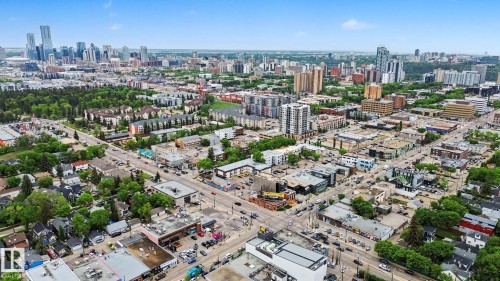 Aerial perspective showcasing a vibrant urban landscape with diverse architectural styles - 308 10933 124 Street, Edmonton, AB 