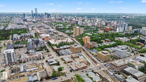 Extensive urban landscape featuring a dense collection of buildings and established tree-lined streets - 308 10933 124 Street, Edmonton, AB 