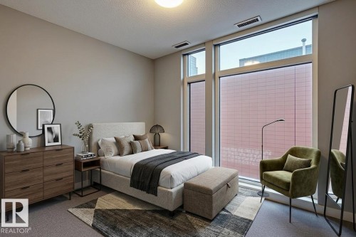 Floor-to-ceiling windows with modern framing - 401 10238 103 Street, Edmonton, AB - Indoor Photo Showing Bedroom