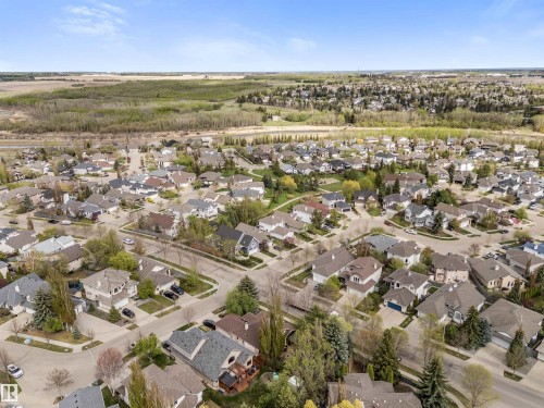 Expansive residential area featuring numerous single-family homes, mature trees, and paved streets - 35 Oakridge Dr, St. Albert, AB - Outdoor With View