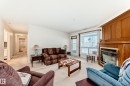 118 6220 Fulton Road, Edmonton, AB  - Indoor Photo Showing Living Room With Fireplace 