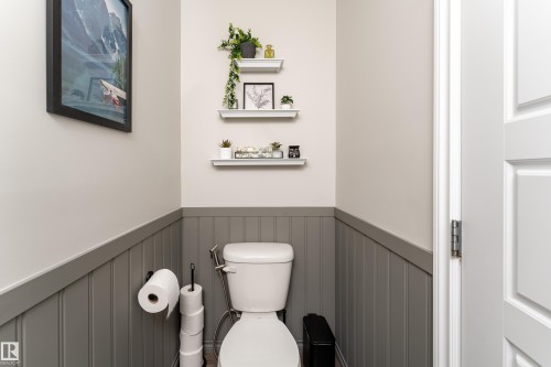 Vertical paneling wainscoting with a coordinating cap molding - 9468 209 St, Edmonton, AB 