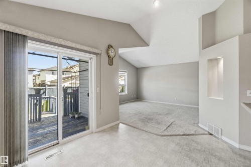 Sliding glass door opening to an outdoor deck - 2012 35A Avenue, Edmonton, AB 