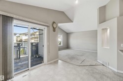 Sliding glass door opening to an outdoor deck - 