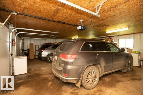 Interior garage with two overhead doors - 57532 Rg Rd 270, Rural Westlock County, AB 