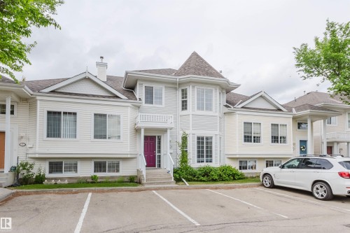 Multi-level townhouse with a distinctive turret feature and varied siding - 38 1780 Glastonbury Boulevard, Edmonton, AB 