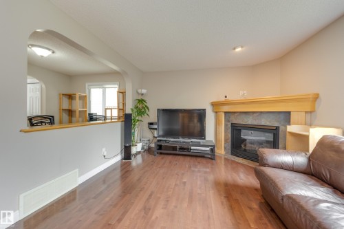 2426 Hagen Way, Edmonton, AB - Indoor Photo Showing Living Room With Fireplace