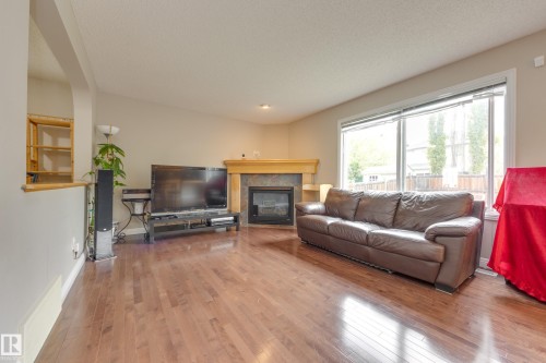 2426 Hagen Way, Edmonton, AB - Indoor Photo Showing Living Room With Fireplace