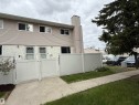 Exterior facade featuring horizontal siding and stucco finishes - 14537 121 Street, Edmonton, AB 