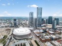 Dynamic urban landscape featuring high-rise buildings, a prominent multi-purpose arena, and a commercial district - 4007 10360 102 Street, Edmonton, AB 