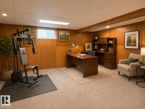 Finished room featuring wood-paneled walls and neutral carpeting - 10912 50 Street, Edmonton, AB 