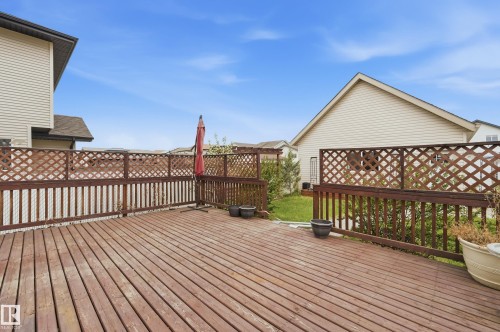 Spacious wood deck with lattice railing, enclosed by privacy fencing - 11628 167A Avenue, Edmonton, AB - Outdoor With Exterior