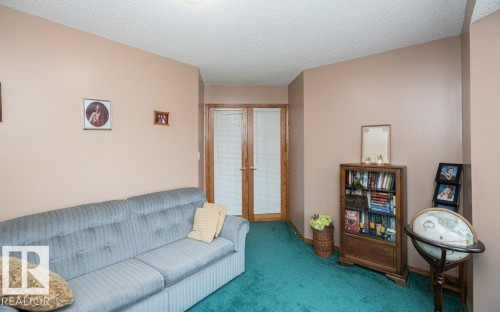 Interior space featuring a textured ceiling and light-toned walls - 60230 Rg Rd 271, Rural Westlock County, AB 