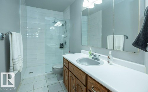 Shower with full glass enclosure and tile surround - 60230 Rg Rd 271, Rural Westlock County, AB 
