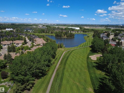 Expansive golf course and lake views from this property - 915 Picard Drive Nw, Edmonton, AB 