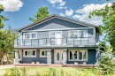 Two-story residence featuring a stucco exterior with stone accents - 6804 102A Avenue, Edmonton, AB 