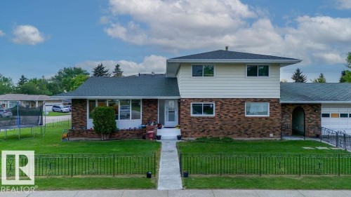 Multi-level residence featuring a brick and siding exterior - 712 Lee Ridge Road, Edmonton, AB 