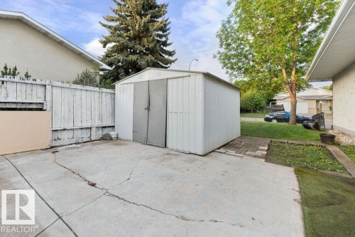 Freestanding metal utility shed with double doors - 712 Lee Ridge Road, Edmonton, AB 