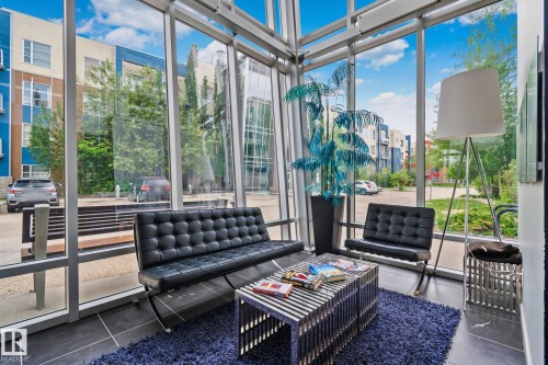 Floor-to-ceiling windows with modern framing - 217 2588 Anderson Way, Edmonton, AB 