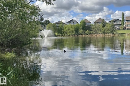 Tranquil waterscape featuring a central fountain - 217 2588 Anderson Way, Edmonton, AB 