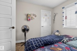 Neutral wall colors, carpeted flooring, and white trim create a consistent aesthetic - 