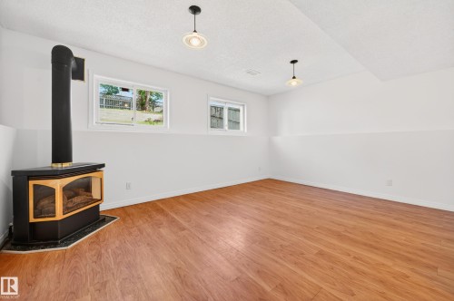 18956 78 Avenue Nw, Edmonton, AB - Indoor Photo Showing Other Room With Fireplace