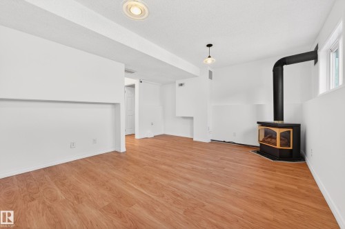 18956 78 Avenue Nw, Edmonton, AB - Indoor Photo Showing Other Room With Fireplace