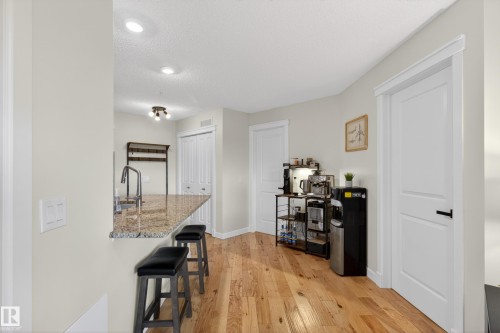 Breakfast bar with a granite countertop and an undermount sink - 211 3719 Whitelaw Lane, Edmonton, AB 