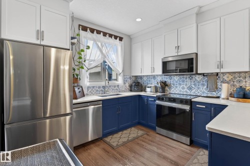 52 Gilmore Way, Spruce Grove, AB - Indoor Photo Showing Kitchen With Stainless Steel Kitchen With Upgraded Kitchen
