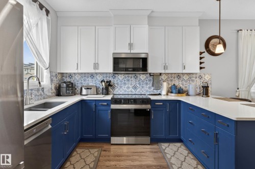 52 Gilmore Way, Spruce Grove, AB - Indoor Photo Showing Kitchen With Double Sink