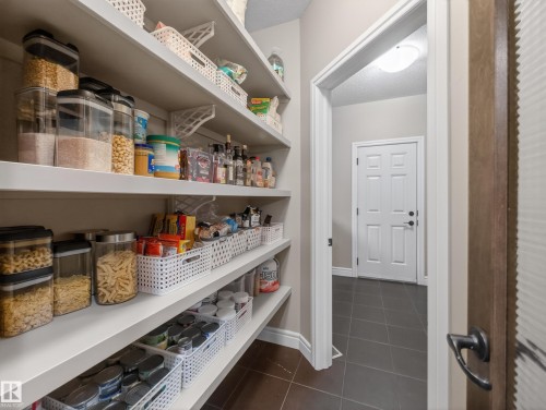 Built-in pantry shelving featuring extensive storage capacity - 5608 Soleil Boulevard, Beaumont, AB 