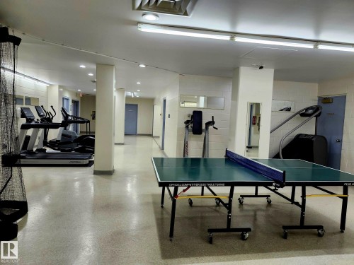 Recreational space featuring a ping-pong table and fitness equipment - 1600 10149 Saskatchewan Drive, Edmonton, AB 