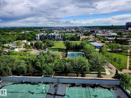 Rooftop recreation area featuring a multi-sport court and ample green space - 1600 10149 Saskatchewan Drive, Edmonton, AB 