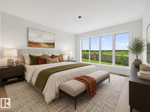 Spacious room featuring a wall of four large windows, light wood-finish flooring, and a neutral color palette - 8108 230 Street, Edmonton, AB 