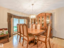 Light wood-finish flooring complements the neutral wall tones - 