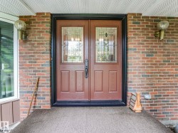 Double entry doors with leaded glass inserts - 