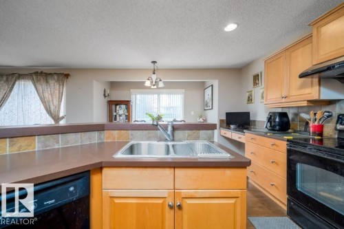 2577 Hanna Crescent, Edmonton, AB - Indoor Photo Showing Kitchen With Double Sink