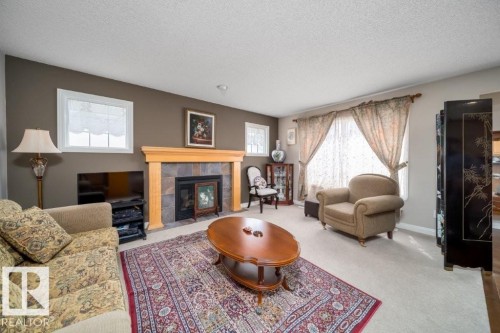 2577 Hanna Crescent, Edmonton, AB - Indoor Photo Showing Living Room With Fireplace