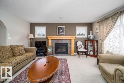 2577 Hanna Crescent, Edmonton, AB - Indoor Photo Showing Living Room With Fireplace