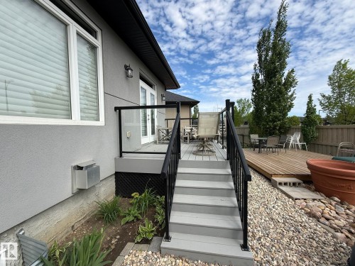 Multi-tiered deck system featuring composite and wood-finish decking - 2 104 Allard Link, Edmonton, AB 